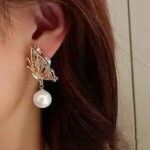 Pair Of Alloy Gold Plated Butterfly Design Pearl Earrings